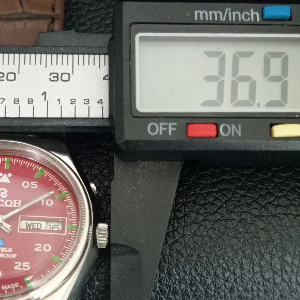 Vintage 1971 Ricoh Automatic Mens Silver Watch W/daydate & Red accents